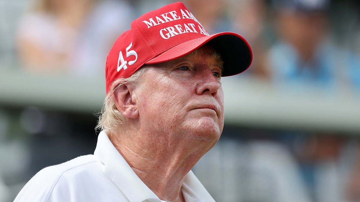 Trump looks on at LIV Golf pro-am