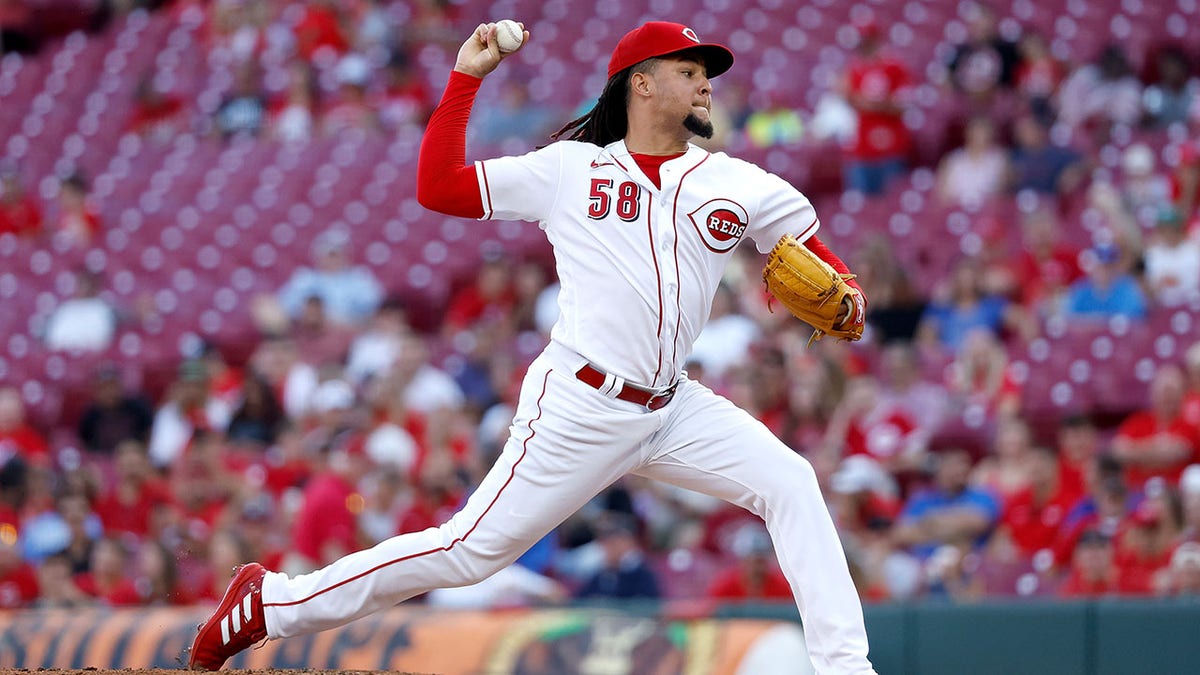 Luis Castillo of the Cincinnati Reds throws a pitch against the Miami Marlins