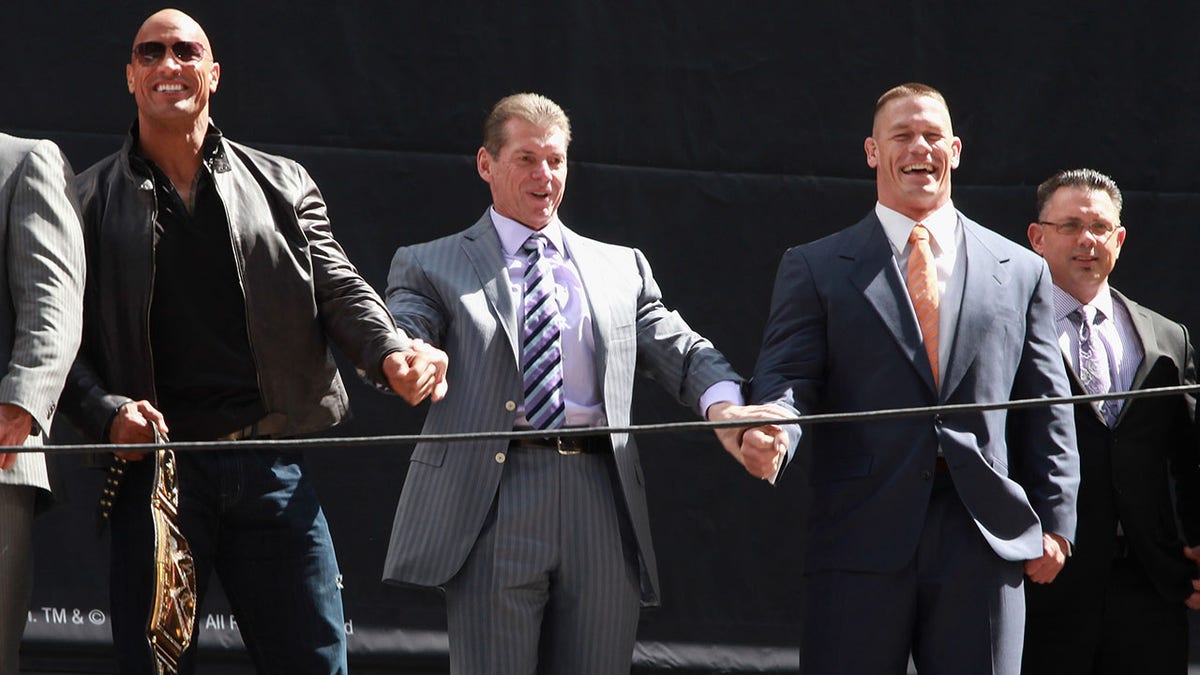Vince McMahon takes a photo at WrestleMania 29 