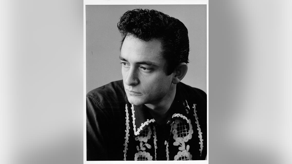 Johnny Cash poses for a portrait