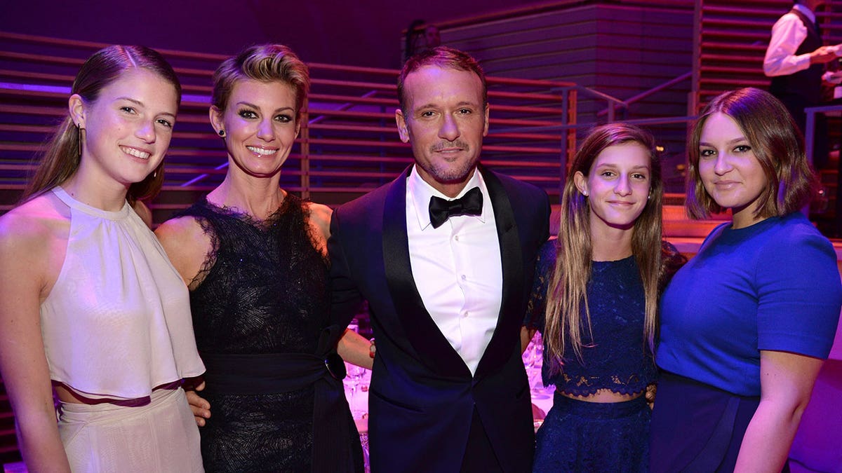 Tim McGraw and Faith Hill with daughters Gracie, Audrey and Maggie