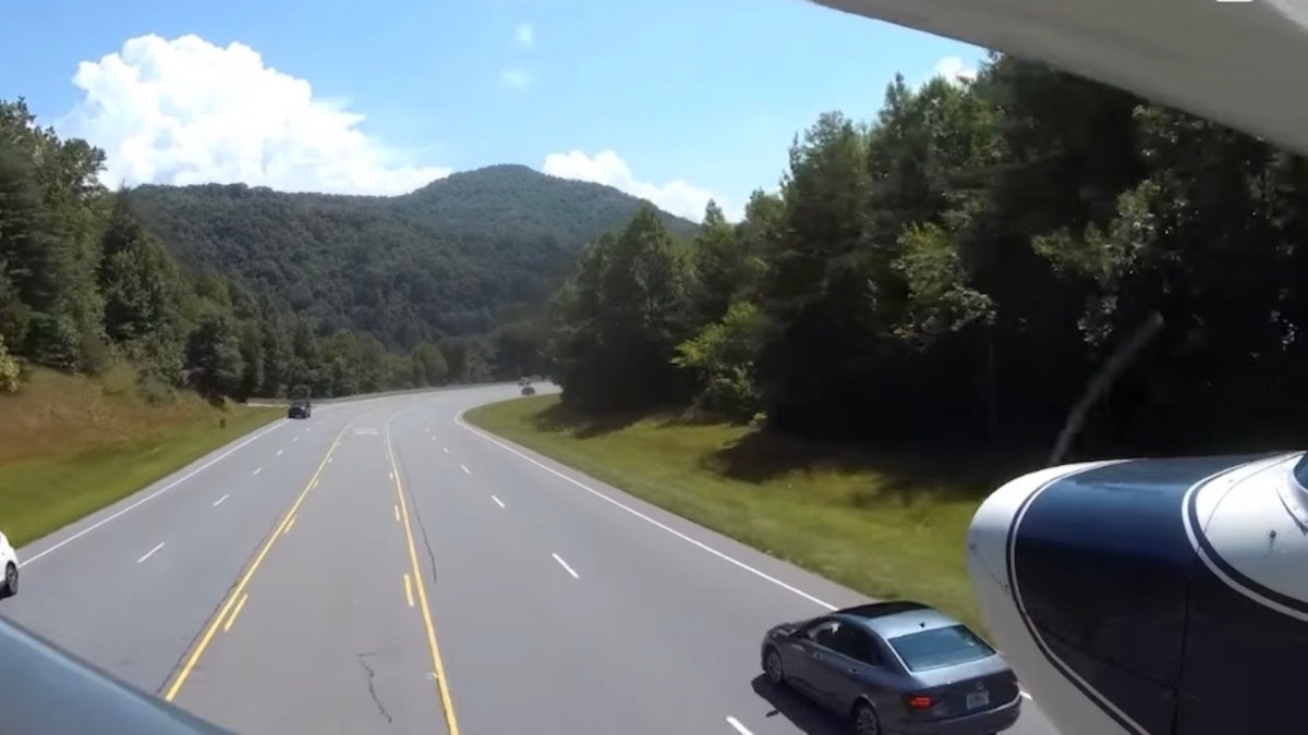 Plane landing on highway