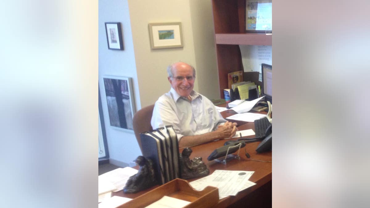 Stephen Straus sits at his desk