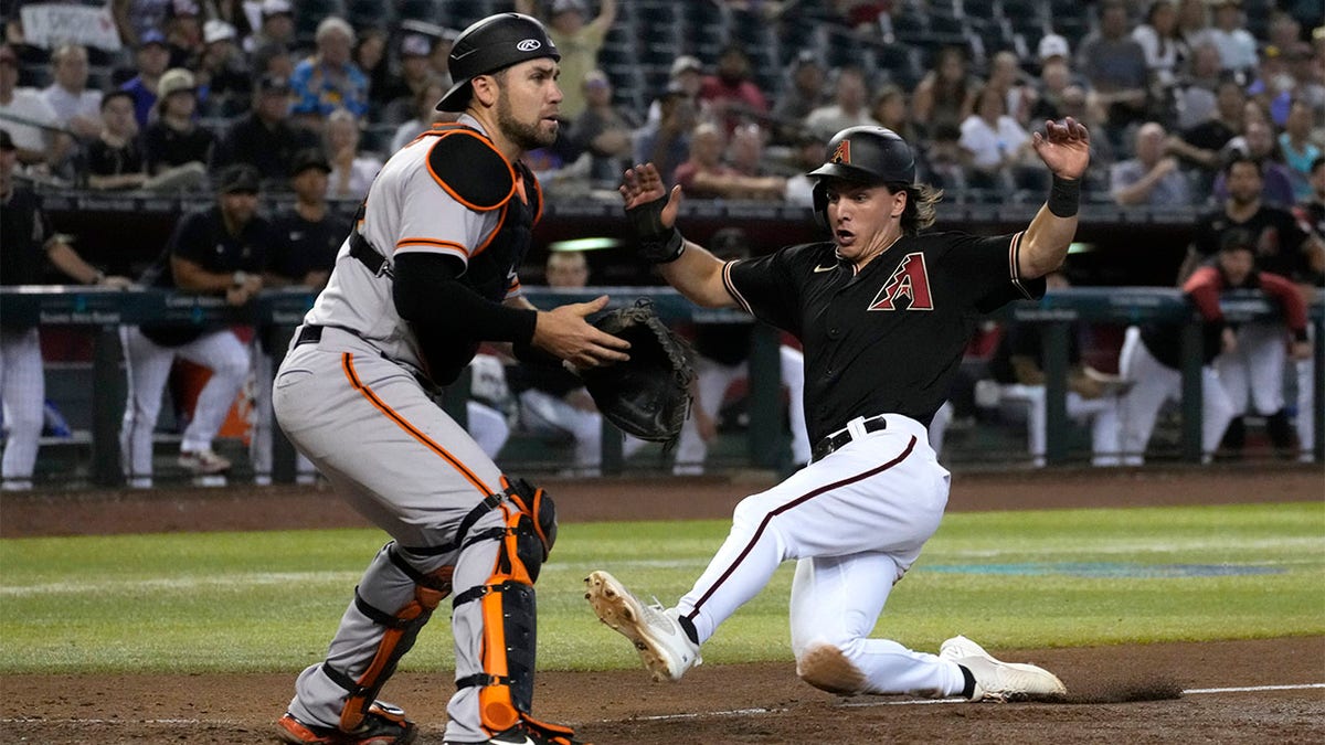 Jake McCarthy scores on an error