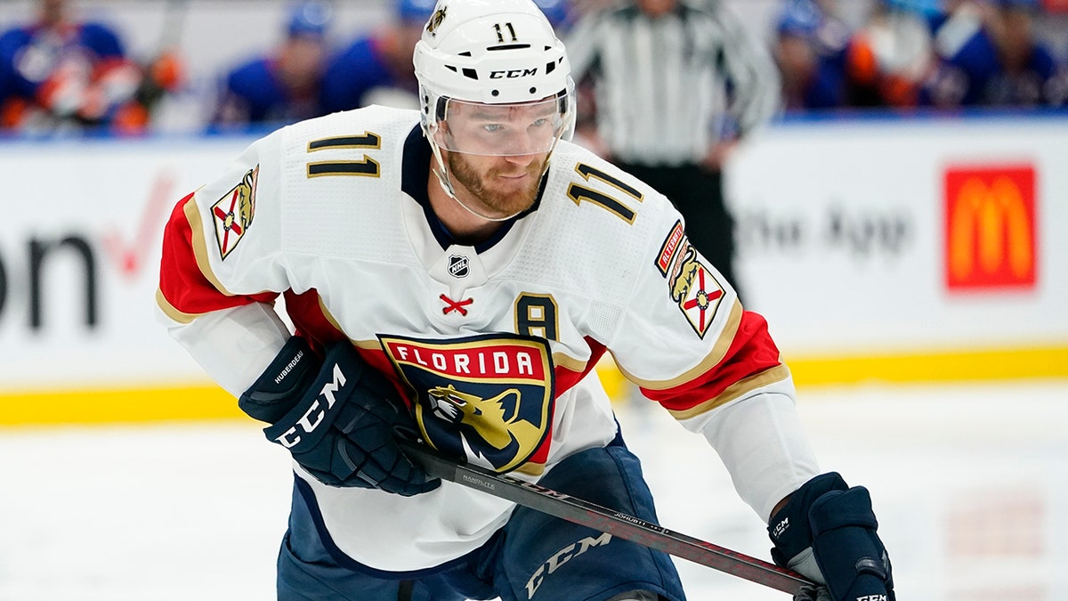 Jonathan Huberdeau chases the puck