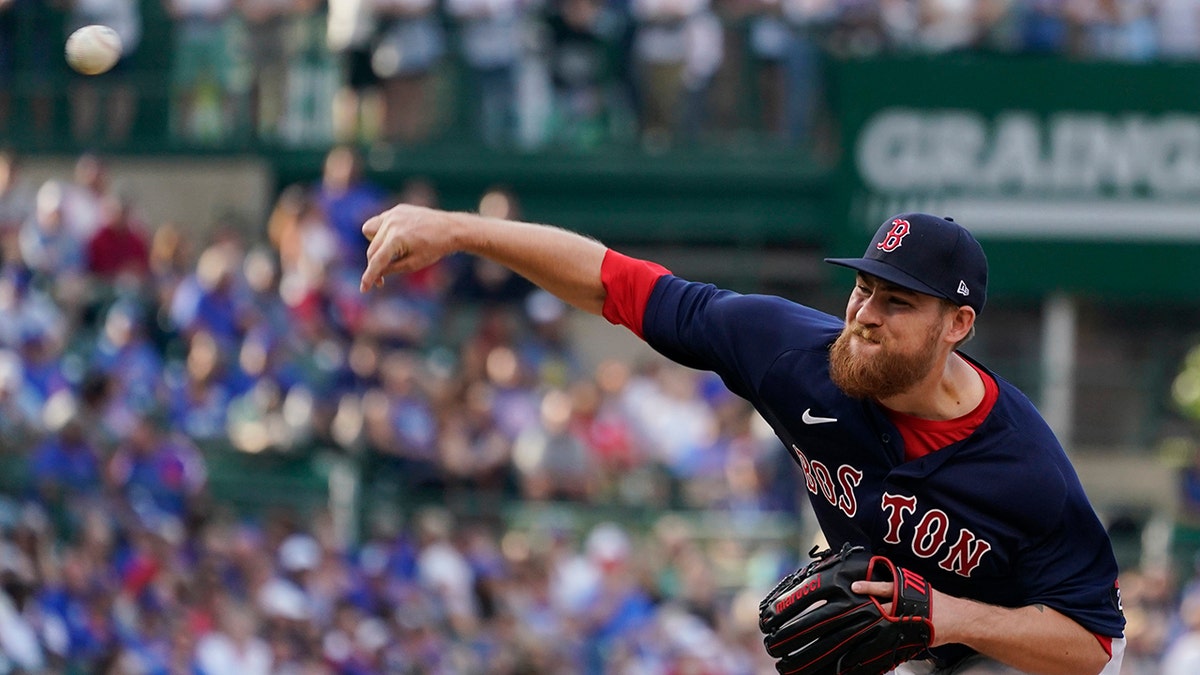 Josh Winckowski throws a pitch