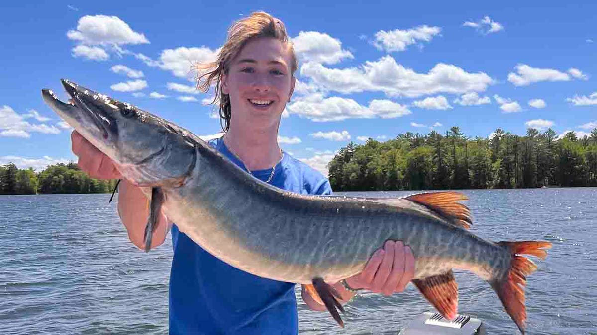 Kaiden Schrieber with his muskie catch