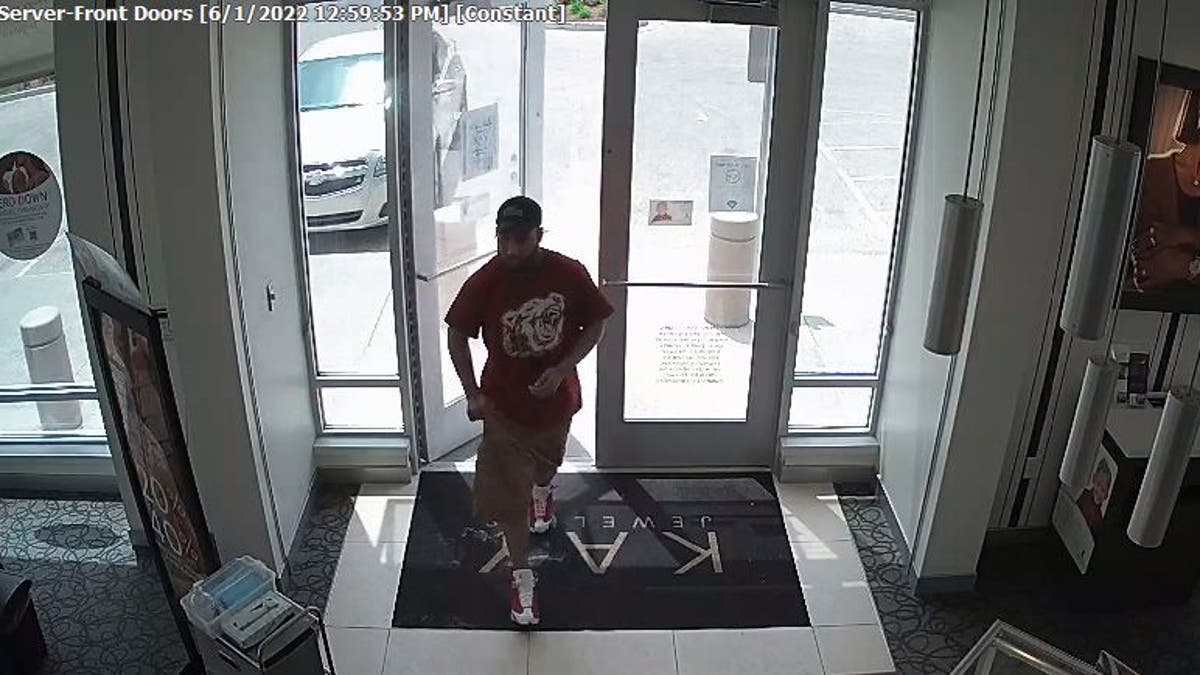Surveillance footage of man entering Kay Jewelers