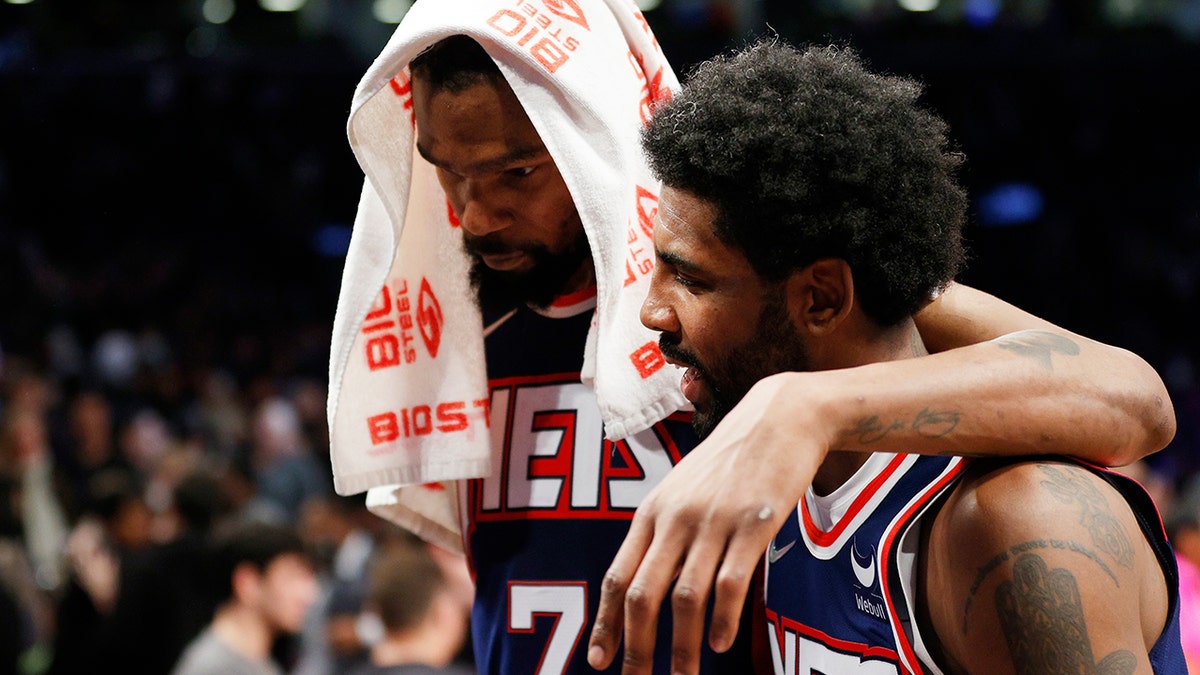 Kevin Durant and Kyrie Irving after Nets beat Cavs