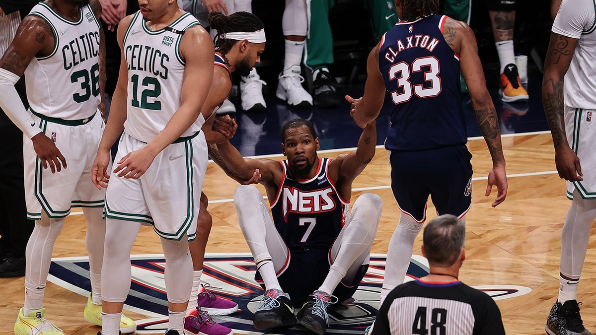 Kevin Durant on the Nets gets picked up by teammates