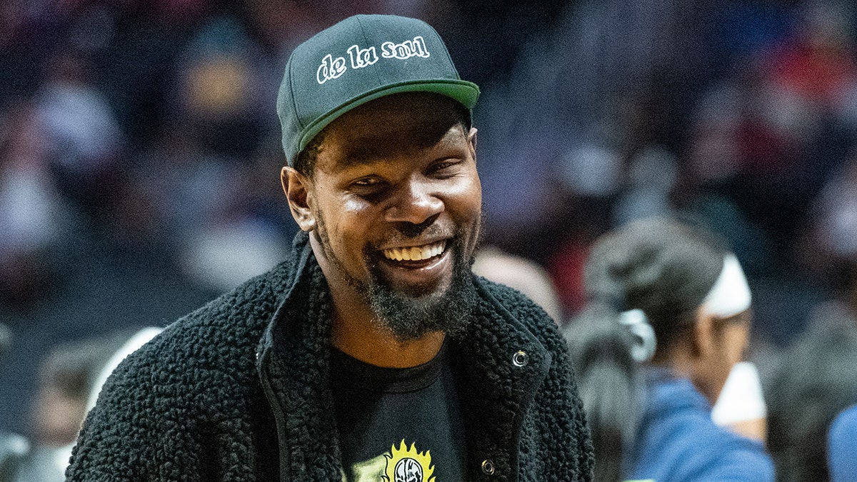 Kevin Durant attends a WNBA game