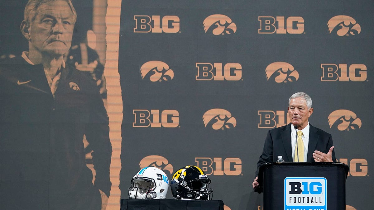 Kirk Ferentz talks to reporters