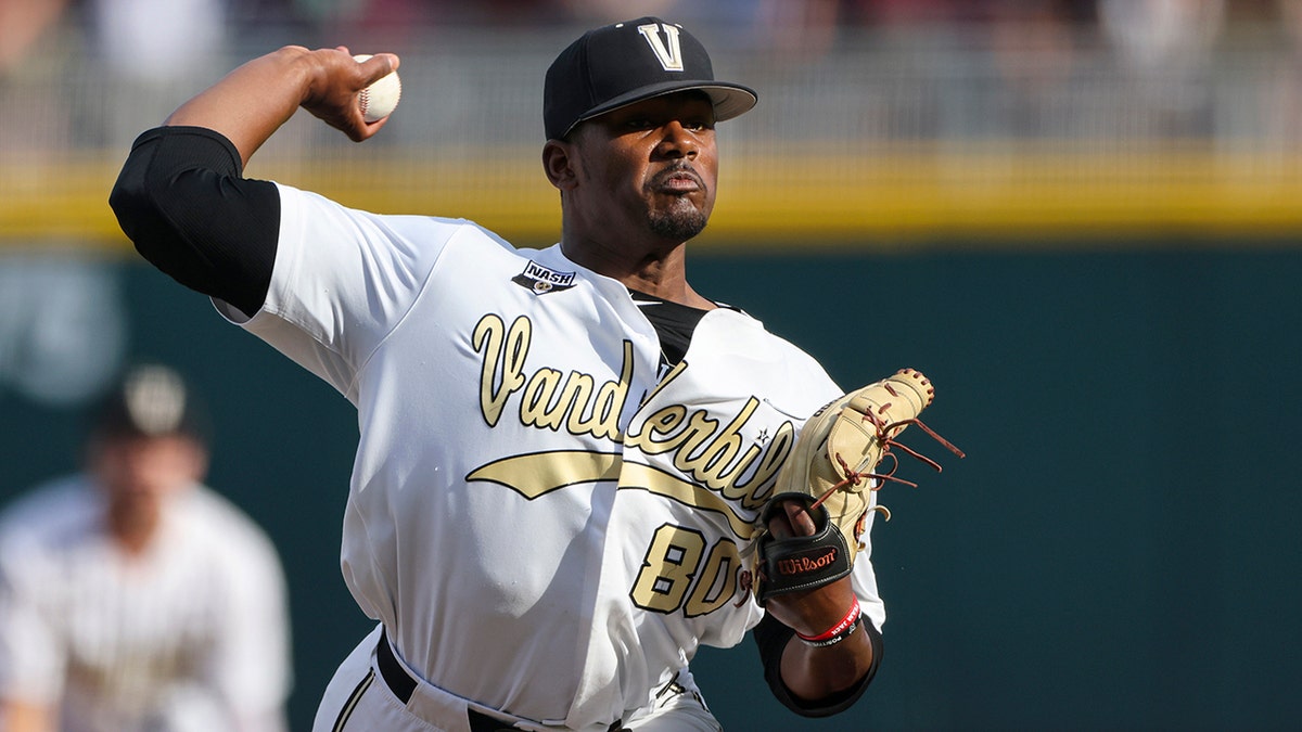 Kumar Rocker throws a pitch