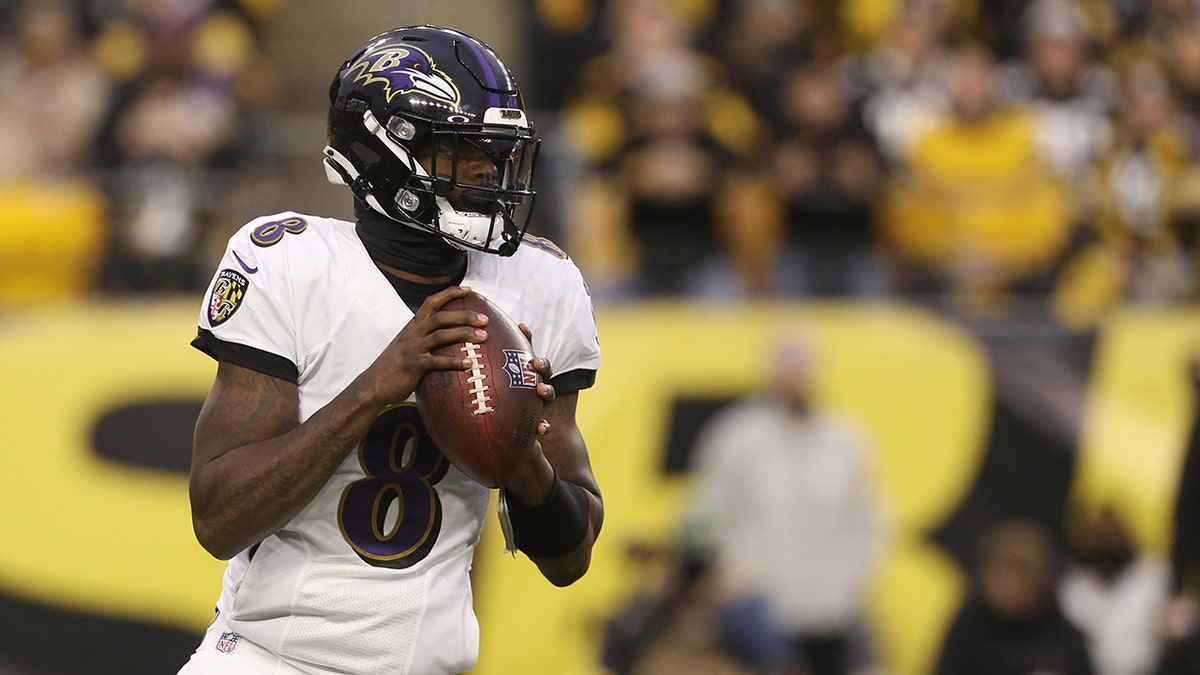 Lamar Jackson looks down field