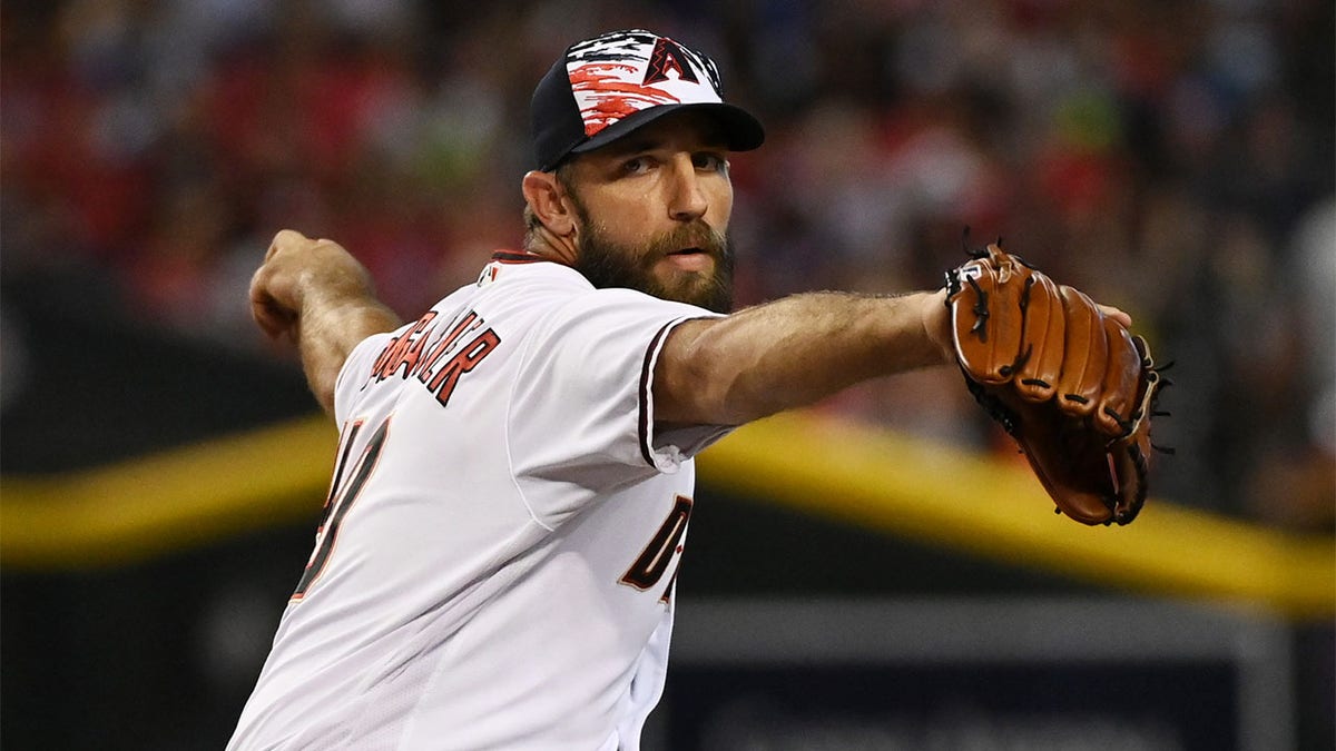 Madison Bumgarner throws a pitch