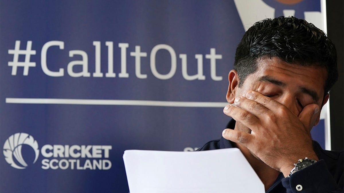 Majid Haq reacts during a press conference