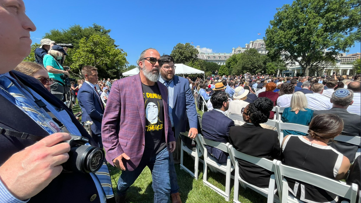 Manuel Oliver protester escorted out of Biden event