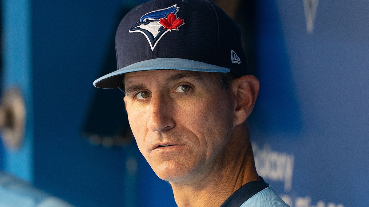 Blue Jays first base coach Mark Budzinski in September 2021