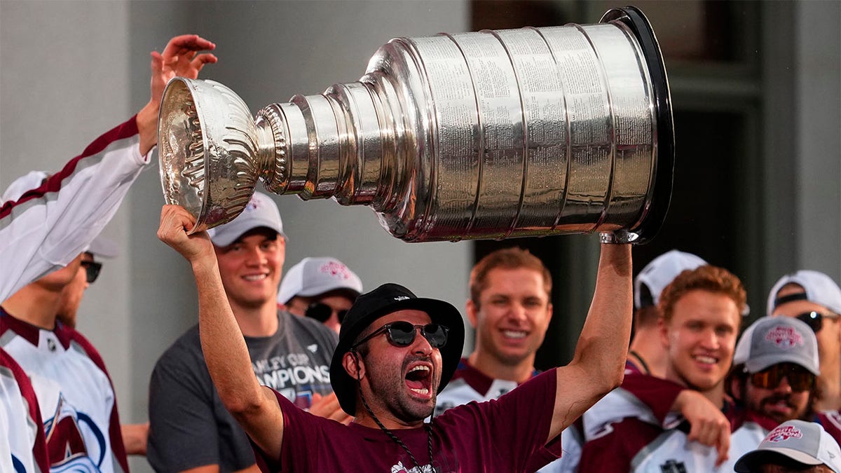 Nazem Kadri raising the Stanley Cup