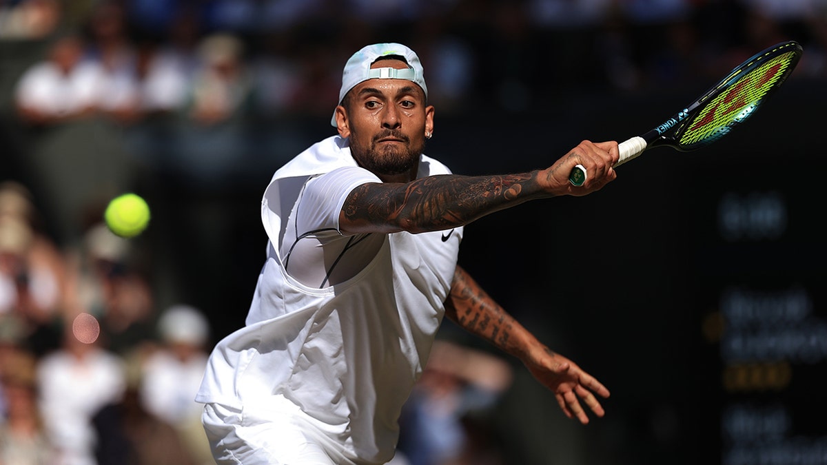 Nick Kyrgios smashes a backhand