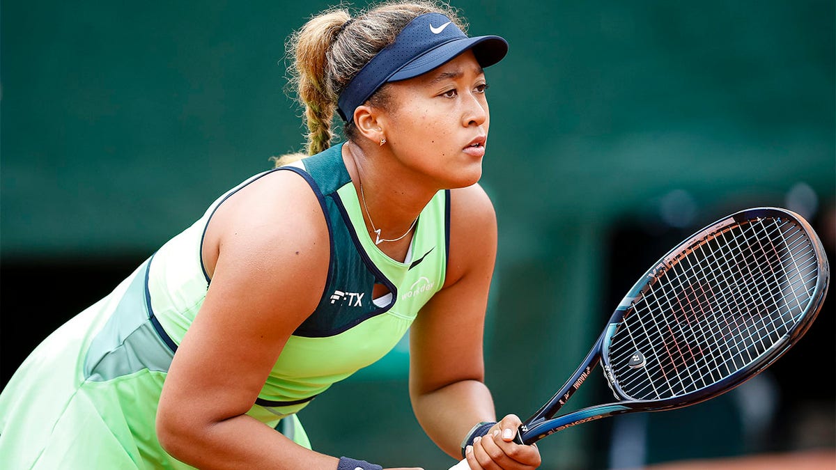 Naomi Osaka gets ready to play a point