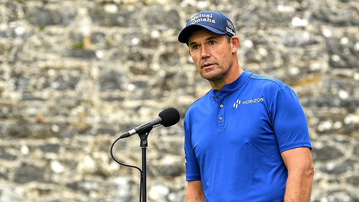 Padraig Harrington speaks to reporters in July 2022