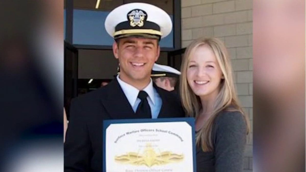 Ridge Alkonis in Navy uniform with award