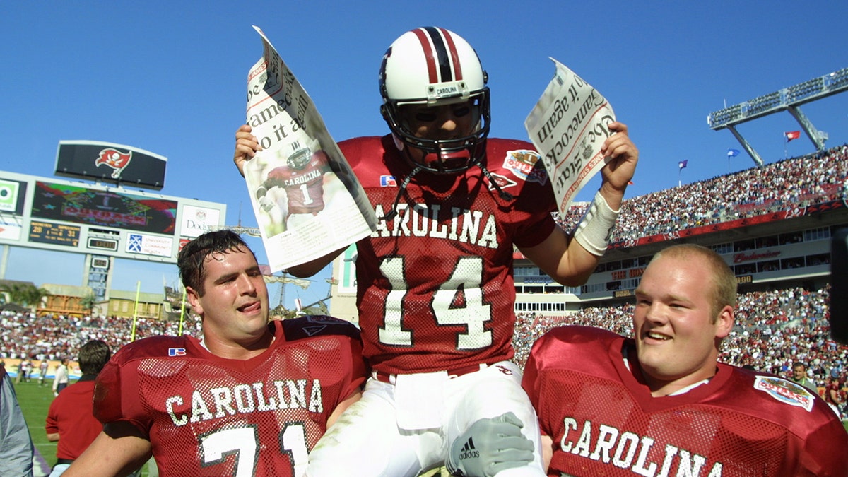 Phil Petty celebrates bowl win