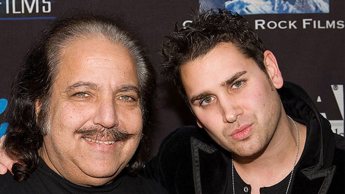 David Pearce and Ron Jeremy smile at a 2009 charity event