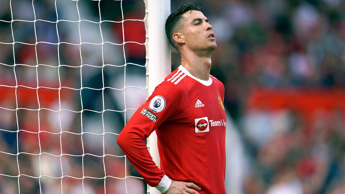 Cristiano Ronaldo leans against goalpost