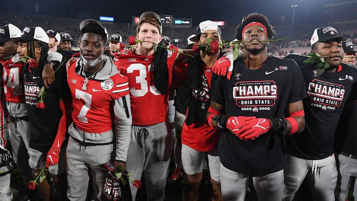 Buckeyes celebrate on the field after Rose Bowl victory