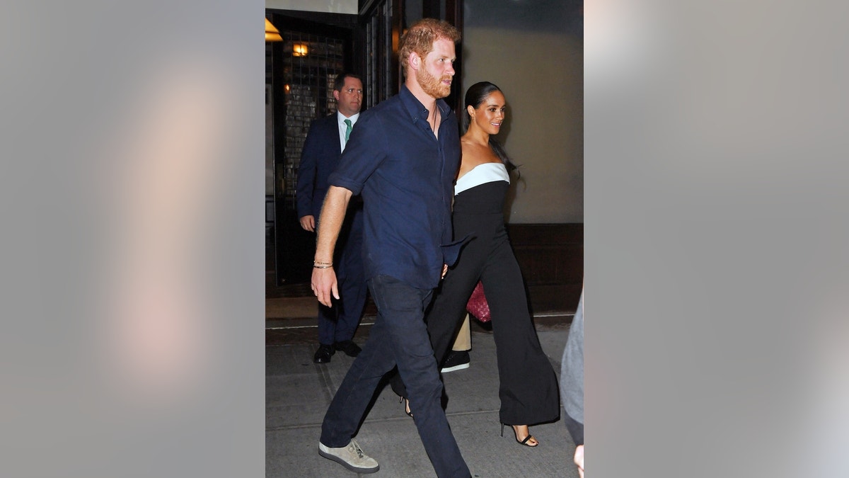 Prince Harry and Meghan Markle leave dinner
