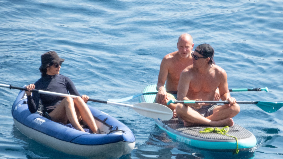 Camila Alves kayaks to her husband at sea