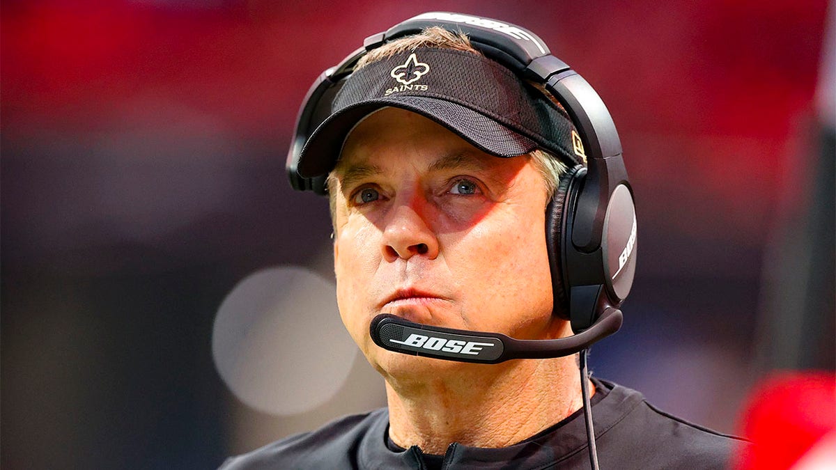 Sean Payton looks onto field