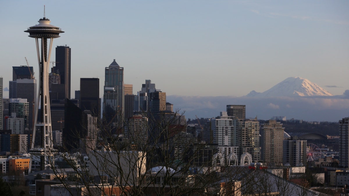 The Seattle Space Needle and Mount Rainier