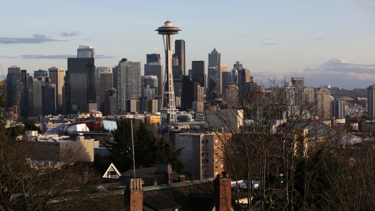  Space Needle, center, amid Seattle skyline