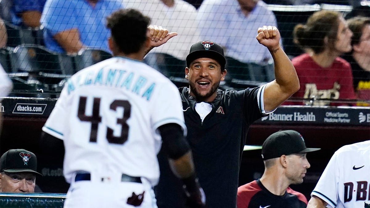 Sergio Alcantara celebrates with David Peralta