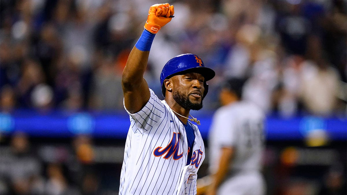 Starling Marte celebrates