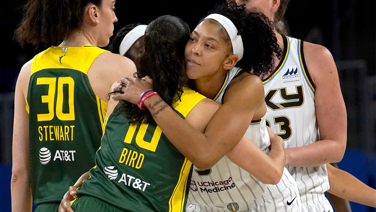 Sue Bird and Candace Parker hug