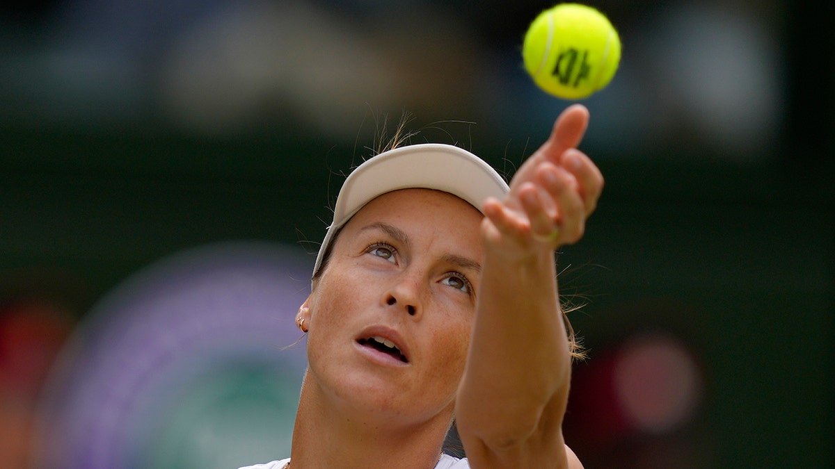 Tatjana Maria serves to Tunisia's Ons Jabeur