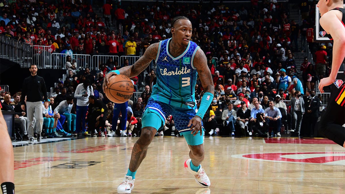 Terry Rozier dribbles the basketball