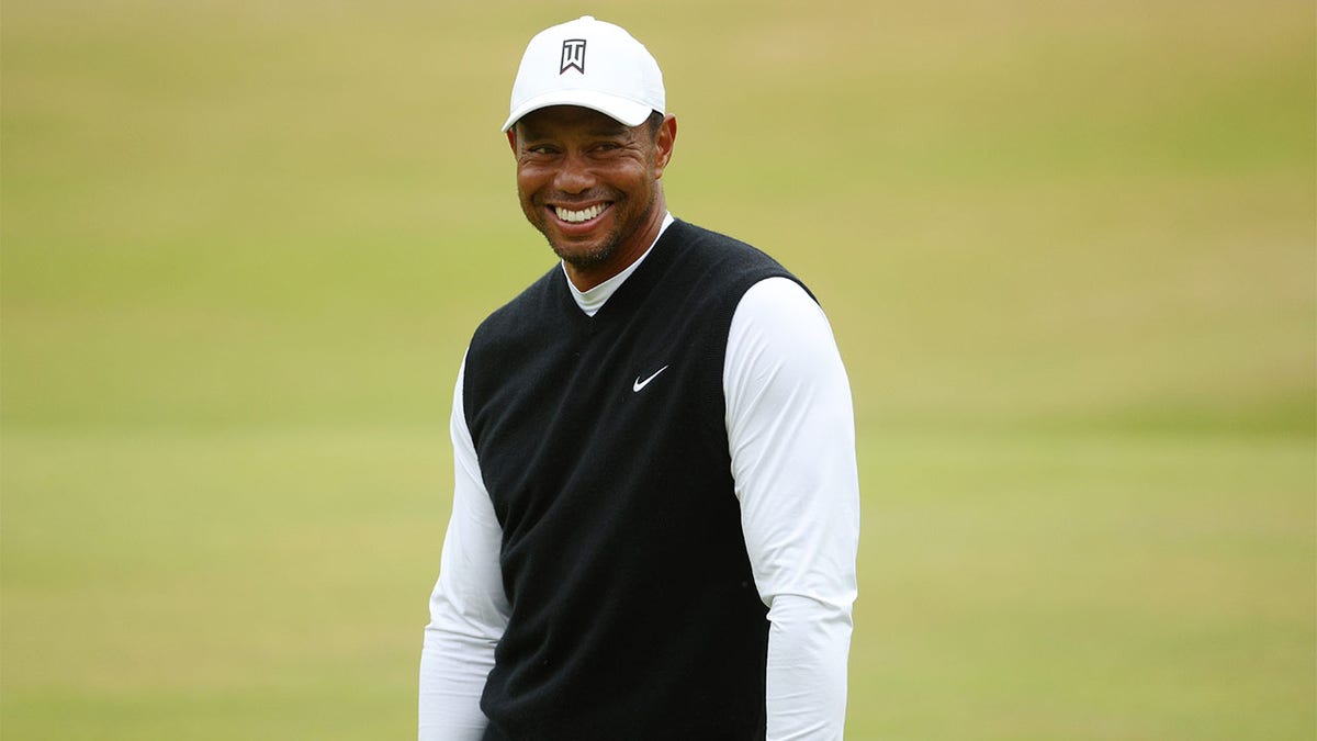 Tiger Woods smiles 
