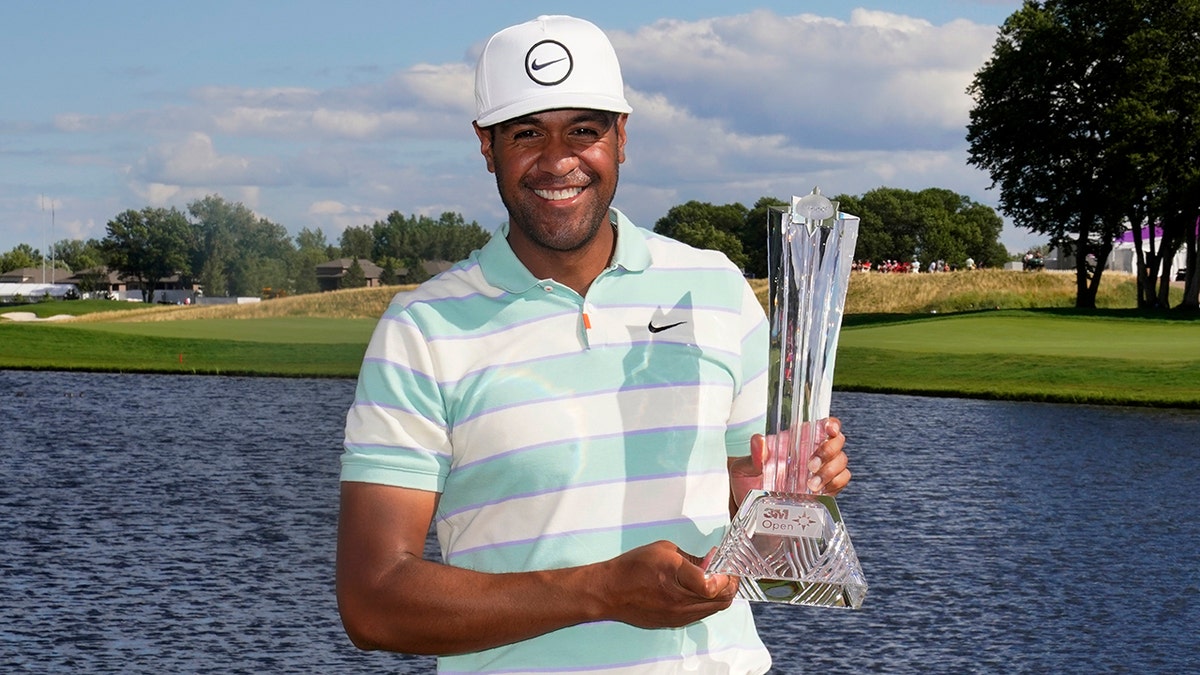 Tony Finau and the 3M Open trophy