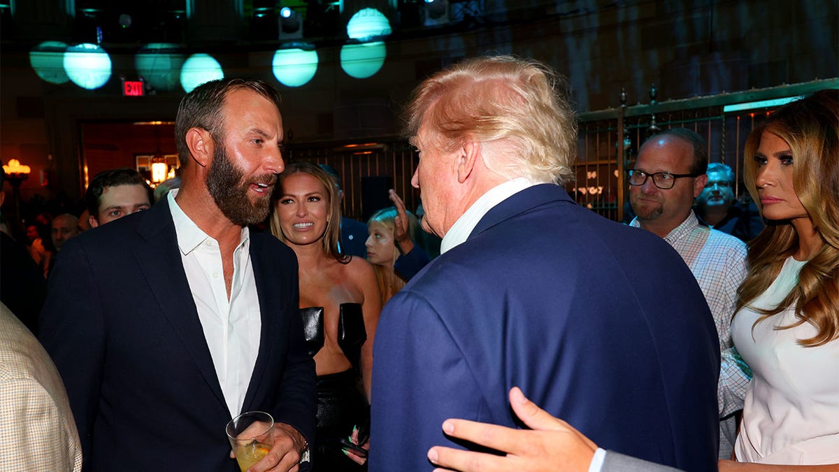 Donald Trump and Dustin Johnson have a conversation