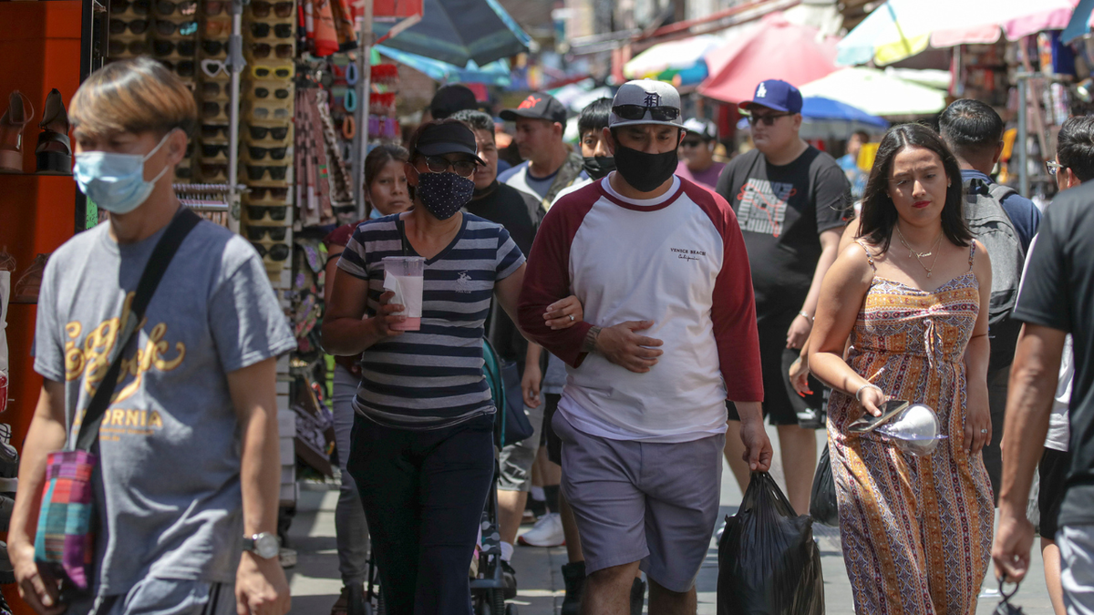 People walking in Los Angeles with masks
