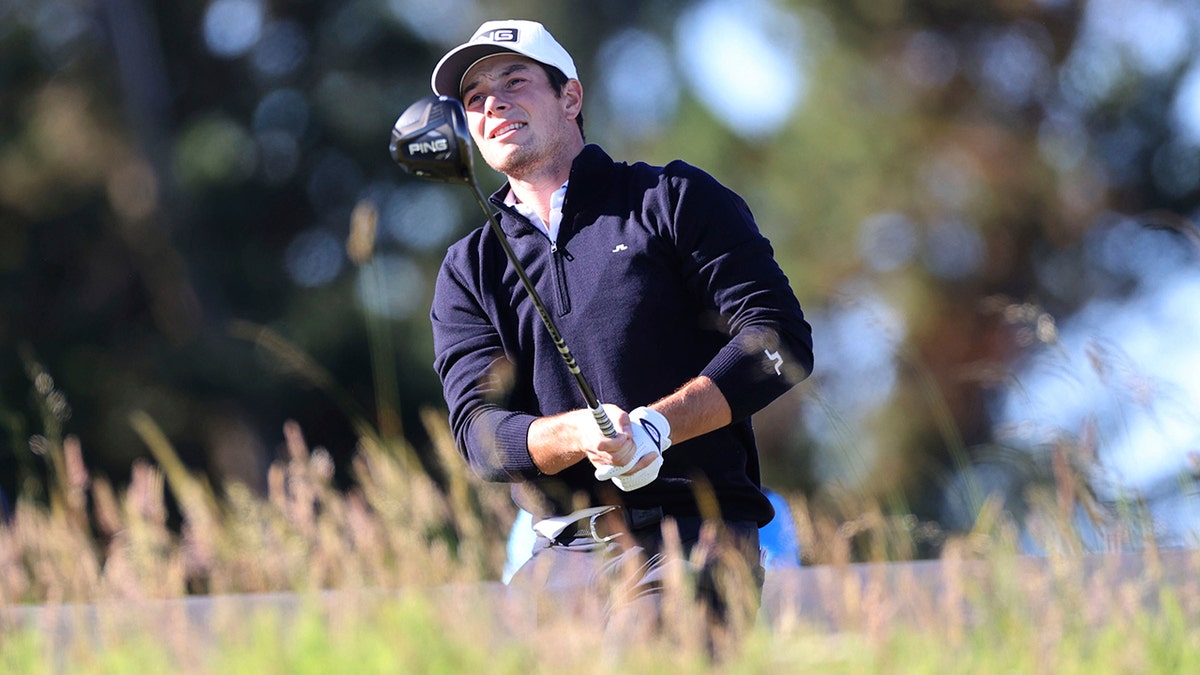 Viktor Hovland takes a swing