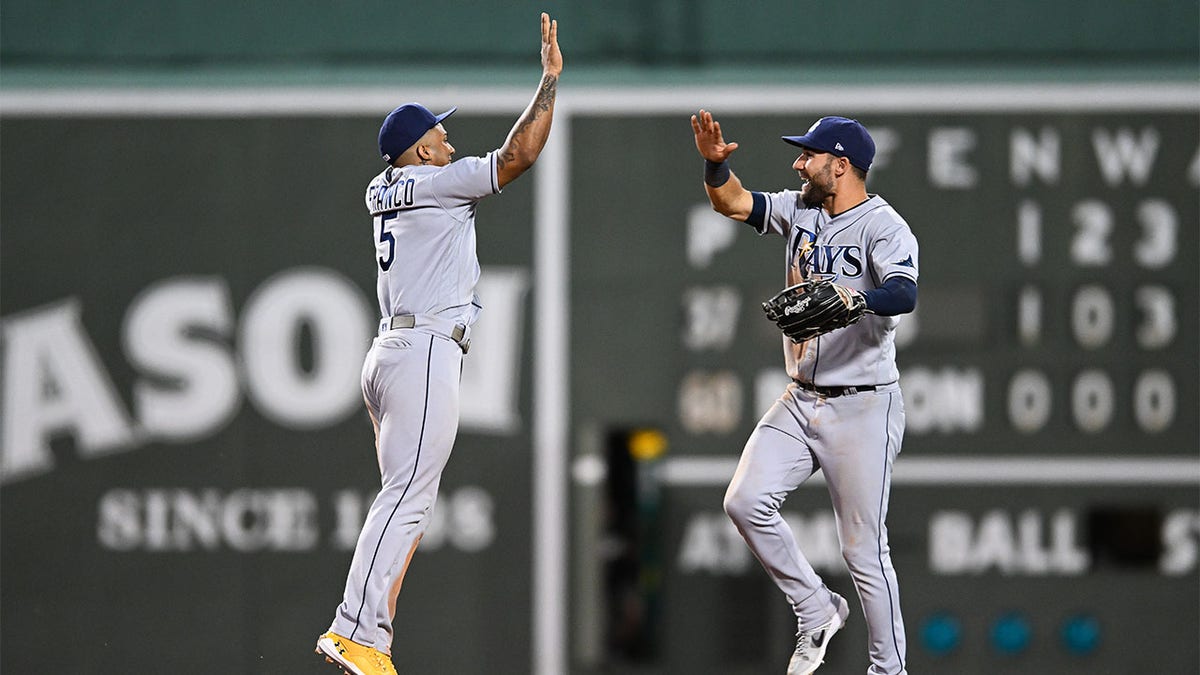 Wander Franco and Kevin Kiermaier high-five