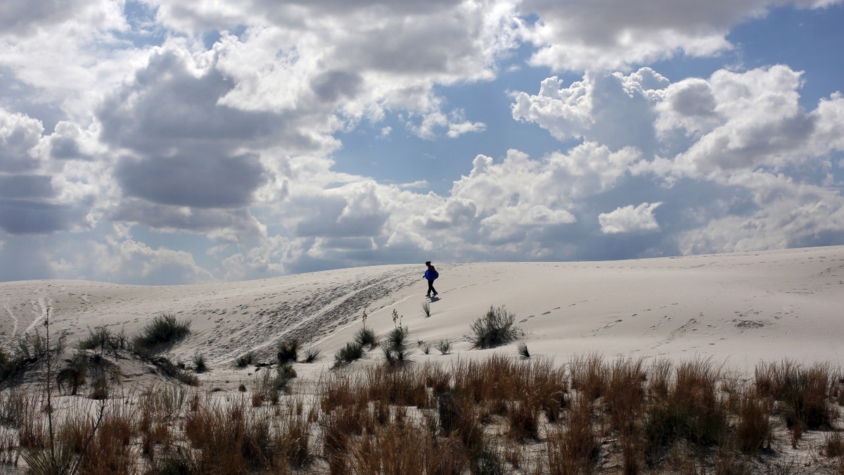 A woman at White Sands National Monument park