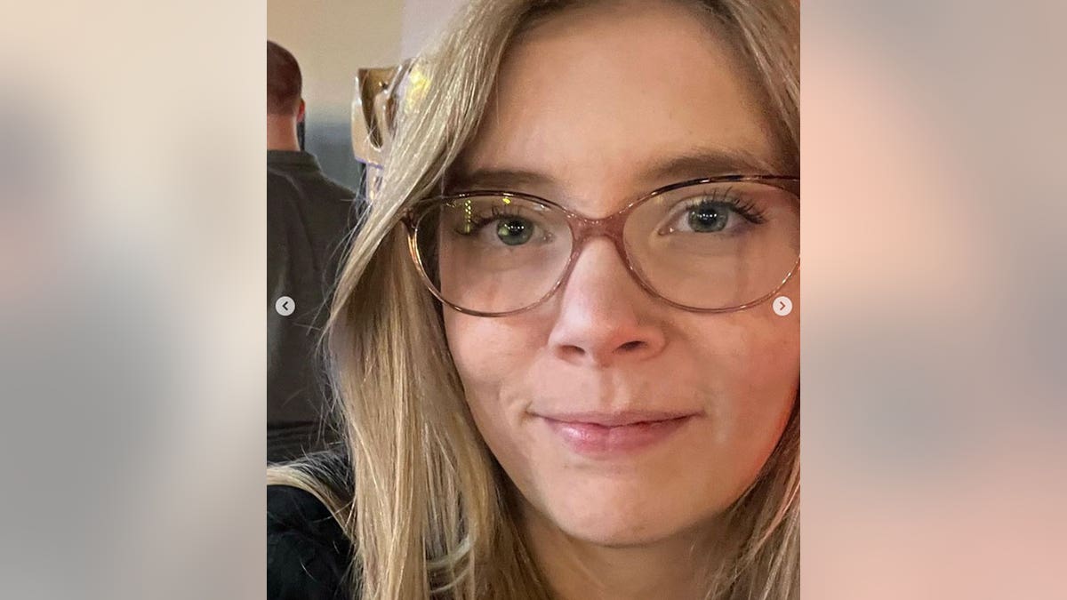 Georgia college grad Caitlin Jensen with glasses