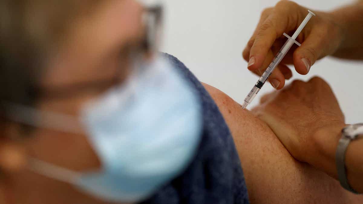 Nurse administering a vaccine